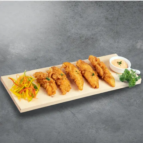 A dish made with bestys chicken fries with salad and sauce