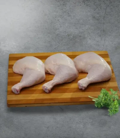 Haritha hari skin on chicken legs on a black plate