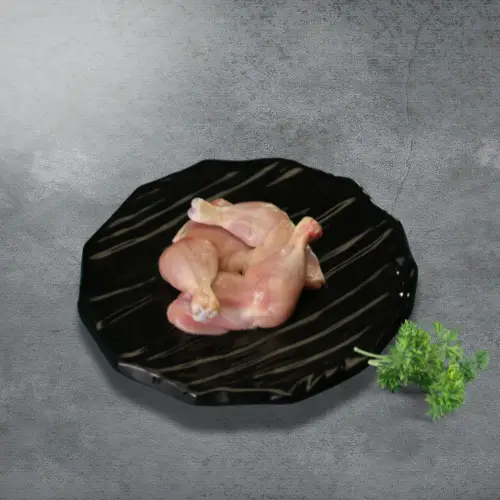 Haritha hari skinless chicken legs on a black plate